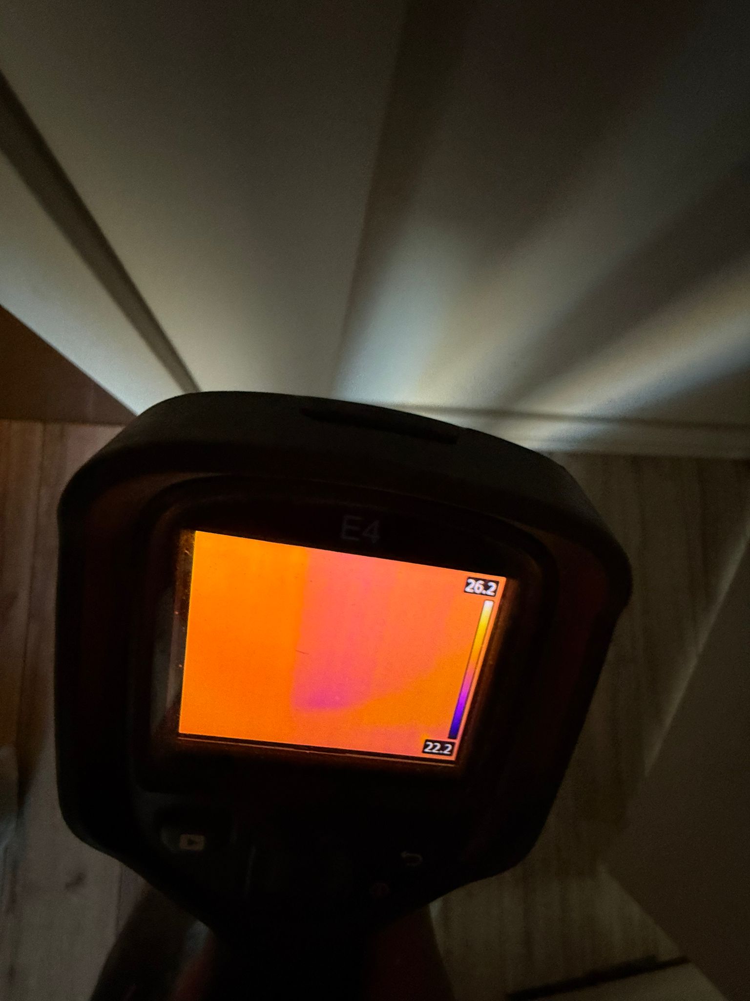 Thermal imaging camera detecting water damage in Ajax home
